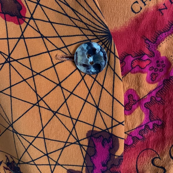 Anne Pinkerton | Travel Map Sleeveless Button Down Vest | burnt orange - Picture 8 of 13